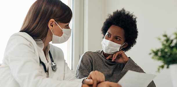patients - doctor and patient going over results